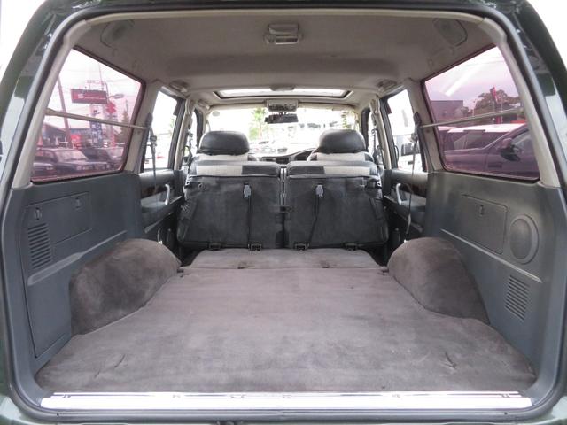 ランドクルーザー８０ ＶＸリミテッド　後期モデル　全塗装済　角目４灯ヘッドライト　３インチＵＰ　ブラッドレーＶ　ジオランダーＭＴタイヤ　左右２本出しマフラー　シートカバー　ＳＤナビ　バックカメラ　ドラレコ　ＥＴＣ　キーレス　ユーザー買取車（14枚目）