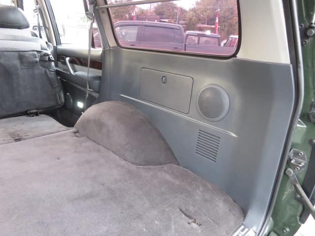 ランドクルーザー８０ ＶＸリミテッド　後期モデル　全塗装済　角目４灯ヘッドライト　３インチＵＰ　ブラッドレーＶ　ジオランダーＭＴタイヤ　左右２本出しマフラー　シートカバー　ＳＤナビ　バックカメラ　ドラレコ　ＥＴＣ　キーレス　ユーザー買取車（21枚目）