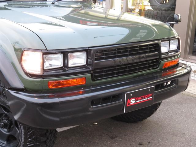 ランドクルーザー８０ ＶＸリミテッド　後期モデル　全塗装済　角目４灯ヘッドライト　３インチＵＰ　ブラッドレーＶ　ジオランダーＭＴタイヤ　左右２本出しマフラー　シートカバー　ＳＤナビ　バックカメラ　ドラレコ　ＥＴＣ　キーレス　ユーザー買取車（28枚目）