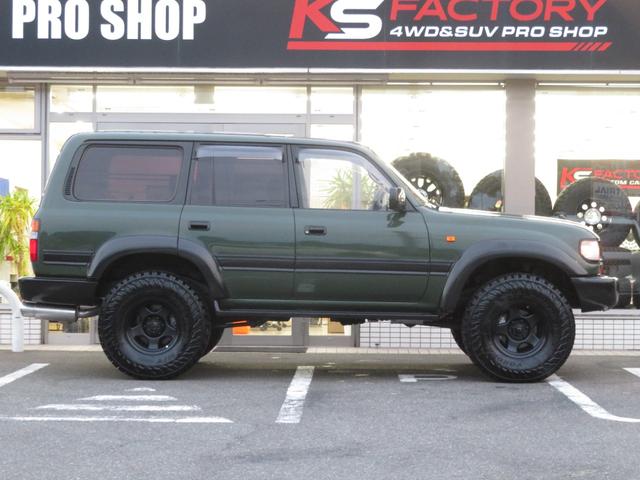 ランドクルーザー８０ ＶＸリミテッド　後期モデル　全塗装済　角目４灯ヘッドライト　３インチＵＰ　ブラッドレーＶ　ジオランダーＭＴタイヤ　左右２本出しマフラー　シートカバー　ＳＤナビ　バックカメラ　ドラレコ　ＥＴＣ　キーレス　ユーザー買取車（38枚目）