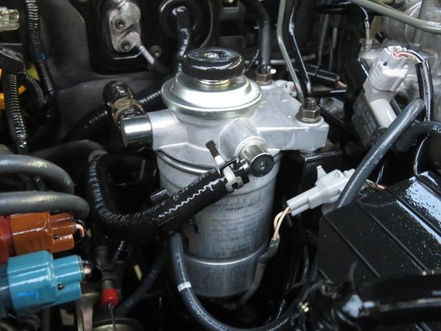 ランドクルーザー８０ ＶＸリミテッド　後期モデル　全塗装済　角目４灯ヘッドライト　３インチＵＰ　ブラッドレーＶ　ジオランダーＭＴタイヤ　左右２本出しマフラー　シートカバー　ＳＤナビ　バックカメラ　ドラレコ　ＥＴＣ　キーレス　ユーザー買取車（63枚目）