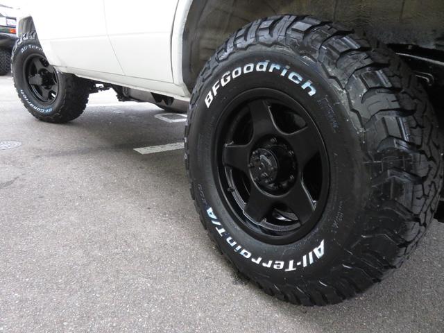 ランドクルーザー70 LX 中期モデル 新品同色全塗装 BJ用グリル 新品前後クロカンバンパー 純正車高 社外ショック 新品ブラッドレーV16インチAW 新品BFグッドリッチ製ATタイヤ 新品黒革調シートカバー 社外HDDナビ(9枚目)