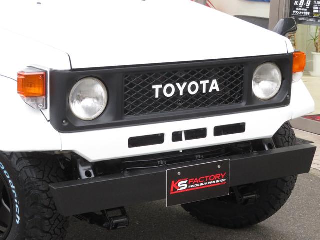 ランドクルーザー70 LX 中期モデル 新品同色全塗装 BJ用グリル 新品前後クロカンバンパー 純正車高 社外ショック 新品ブラッドレーV16インチAW 新品BFグッドリッチ製ATタイヤ 新品黒革調シートカバー 社外HDDナビ(16枚目)