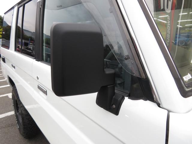 ランドクルーザー70 LX 中期モデル 新品同色全塗装 BJ用グリル 新品前後クロカンバンパー 純正車高 社外ショック 新品ブラッドレーV16インチAW 新品BFグッドリッチ製ATタイヤ 新品黒革調シートカバー 社外HDDナビ(20枚目)