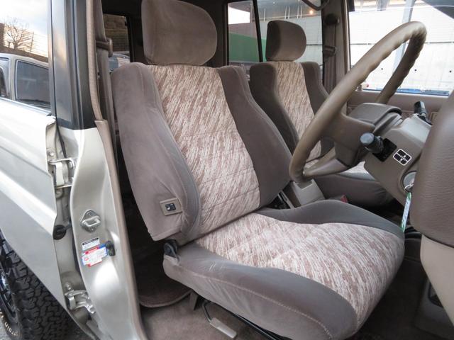 ランドクルーザープラド ＳＸワイド　後期モデル　同色全塗装済　ナロー仕様　新品クリスタルレンズ　２インチＵＰ　社外ショックアブソーバー　新品当社オリジナル１６インチＡＷ　新品ＢＦグッドリッチ製ＡＴタイヤ　社外ナビ　バックカメラ　ＥＴＣ（9枚目）