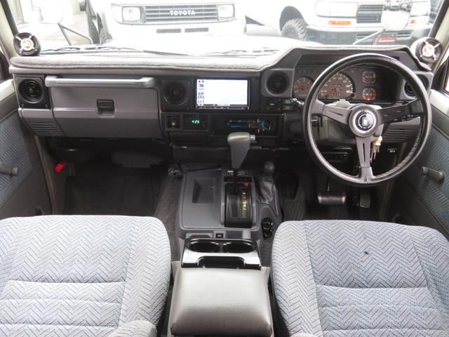 ランドクルーザー７０ ＬＸ　前後リーフ最終型　７６フェイス　ＢＪグリル　フェンダーミラー　リフトＵＰ公認済　新品ＤＥＡＮ製ＡＷ　新品ジオランダーＭＴタイヤ　社外ＳＤナビ　フルセグＴＶ　Ｂｌｕｅｔｏｏｔｈ対応　バックカメラ　ＥＴＣ（7枚目）