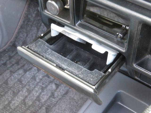 ランドクルーザー７０ ＺＸ　後期フロントコイルモデル　ナロー仕様　４ナンバー　輸出用グリル　純正車高　純正スチールホイール　ジオランダーＭＴタイヤ　サンルーフ　ウッドコンビハンドル　ウッドコンビシフト　リアヒーター　寒冷地仕様（23枚目）