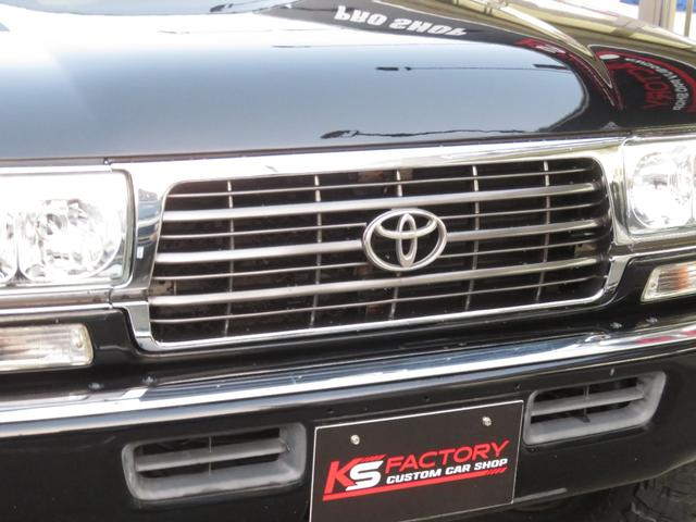 ランドクルーザー８０ ＶＸリミテッド　中期モデル　全塗装済黒　新品ヘッドライト　クリスタルレンズ　３インチＵＰ　社外ショック　プロコンプ製１６インチＡＷ　新品ＴＯＹＯ製ＭＴタイヤ　社外マフラー　シートカバー　社外ナビ　バックカメラ　ＥＴＣ（15枚目）