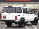 ランドクルーザー70 LX 中期モデル 新品同色全塗装 BJ用グリル 新品前後クロカンバンパー 純正車高 社外ショック 新品ブラッドレーV16インチAW 新品BFグッドリッチ製ATタイヤ 新品黒革調シートカバー 社外HDDナビ(6枚目)