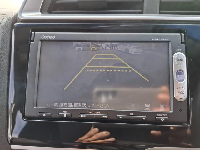 フィットハイブリッド Ｆパッケージ　ＥＴＣ　バックカメラ　ナビ　ＴＶ　スマートキー　電動格納ミラー　ＡＴ　盗難防止システム　衝突安全ボディ　ＣＤ　ＵＳＢ　ミュージックプレイヤー接続可　Ｂｌｕｅｔｏｏｔｈ　チップアップシート（4枚目）