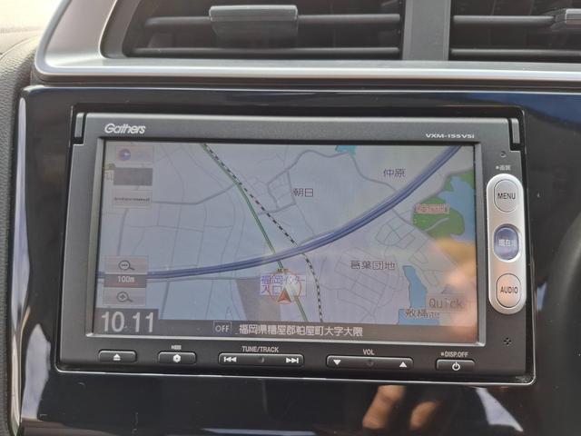 フィットハイブリッド Ｆパッケージ　ＥＴＣ　バックカメラ　ナビ　ＴＶ　スマートキー　電動格納ミラー　ＡＴ　盗難防止システム　衝突安全ボディ　ＣＤ　ＵＳＢ　ミュージックプレイヤー接続可　Ｂｌｕｅｔｏｏｔｈ　チップアップシート（6枚目）