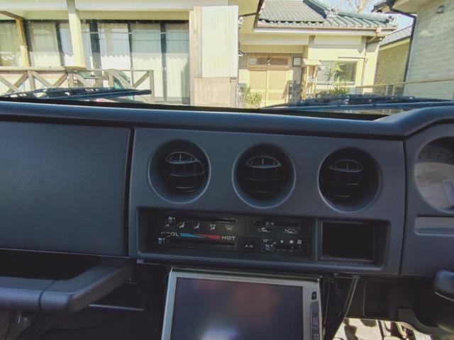 ジムニー ワイルドウインド　４ＷＤ　ＭＴ　アルミホイール　エアコン　社外バンパーＦ．Ｒ（4枚目）
