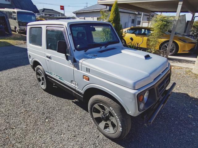 ジムニー ワイルドウインド　４ＷＤ　ＭＴ　アルミホイール　エアコン　社外バンパーＦ．Ｒ（13枚目）