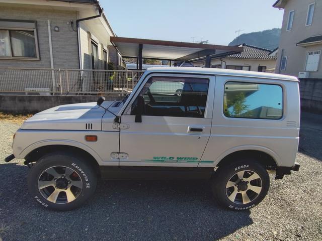ジムニー ワイルドウインド　４ＷＤ　ＭＴ　アルミホイール　エアコン　社外バンパーＦ．Ｒ（14枚目）