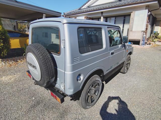 ジムニー ワイルドウインド　４ＷＤ　ＭＴ　アルミホイール　エアコン　社外バンパーＦ．Ｒ（17枚目）