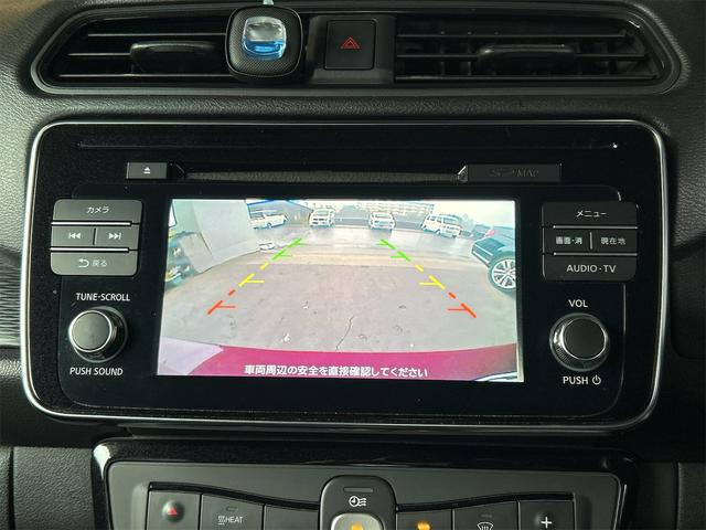リーフ Ｘ　１０万台記念車　ＥＴＣ　バックカメラ　ナビ　ＴＶ　クリアランスソナー　オートクルーズコントロール　衝突被害軽減システム　アルミホイール　オートライト　ＬＥＤヘッドランプ　スマートキー　電動格納ミラー　シートヒーター（5枚目）