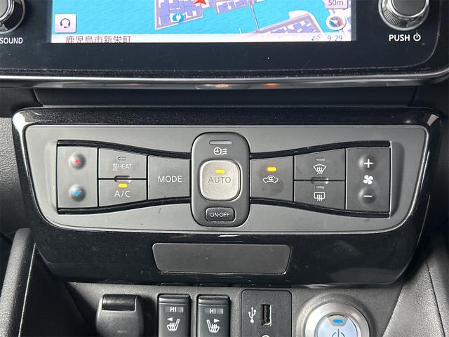 リーフ Ｘ　１０万台記念車　ＥＴＣ　バックカメラ　ナビ　ＴＶ　クリアランスソナー　オートクルーズコントロール　衝突被害軽減システム　アルミホイール　オートライト　ＬＥＤヘッドランプ　スマートキー　電動格納ミラー　シートヒーター（6枚目）