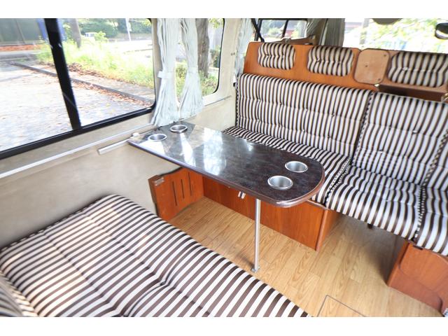 キャンピングカー ビークル ベッセル 9人乗り サブバッテリー 冷蔵庫 シンク 外部電源 8ナンバー HDDナビ ACコンセント 給排水ポリタンク ベンチレーター テーブル ETC ガソリン 2WD 2段ベッド(3枚目)