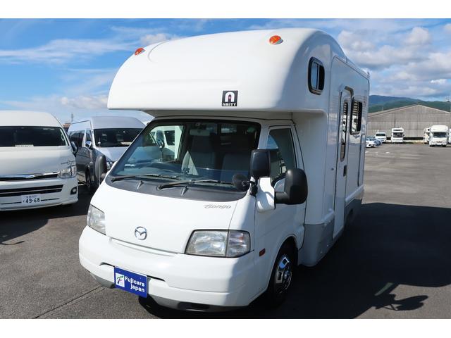 キャンピングカー AtoZ アミティ 7名乗車 シンク 冷蔵庫 FFヒーター リヤクーラー サブBT ルーフベント シンク兼用アウターシャワー 常設2段ベッド ETC 外部電源 テーブル カーテン DCソケット(17枚目)