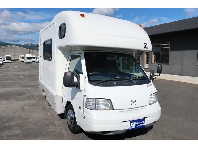 キャンピングカー AtoZ アミティ 7名乗車 シンク 冷蔵庫 FFヒーター リヤクーラー サブBT ルーフベント シンク兼用アウターシャワー 常設2段ベッド ETC 外部電源 テーブル カーテン DCソケット(18枚目)