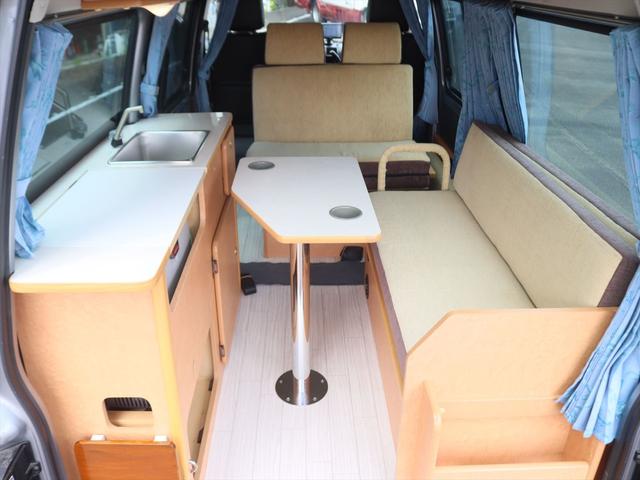 ボンゴバン キャンピングカー広島　プチ　チョイス２　キャンピングカー　ポップアップルーフ　ＦＦヒーター　ポータブル冷蔵庫　シンク　引出式カセットコンロ　サブバッテリー　走行充電　外部電源　網戸２枚　カーテン　リアラダー（5枚目）