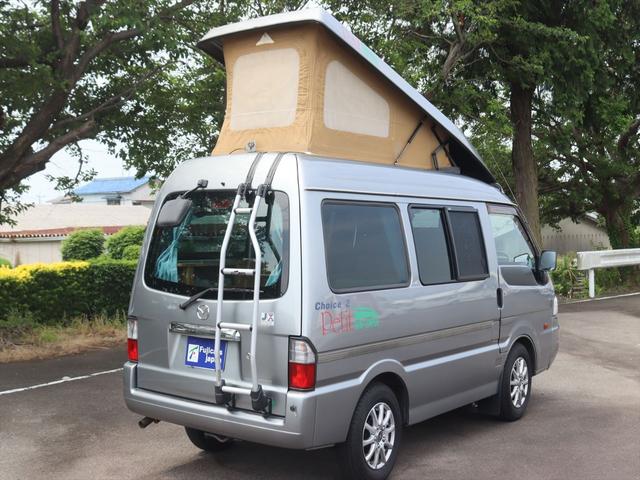 ボンゴバン キャンピングカー広島　プチ　チョイス２　キャンピングカー　ポップアップルーフ　ＦＦヒーター　ポータブル冷蔵庫　シンク　引出式カセットコンロ　サブバッテリー　走行充電　外部電源　網戸２枚　カーテン　リアラダー（18枚目）