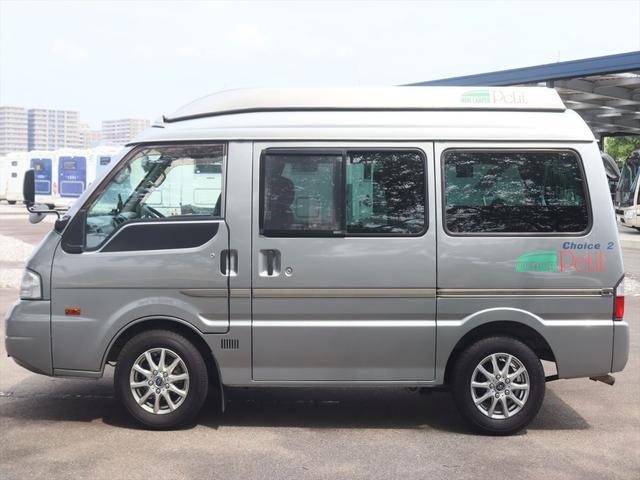 ボンゴバン キャンピングカー広島　プチ　チョイス２　キャンピングカー　ポップアップルーフ　ＦＦヒーター　ポータブル冷蔵庫　シンク　引出式カセットコンロ　サブバッテリー　走行充電　外部電源　網戸２枚　カーテン　リアラダー（29枚目）