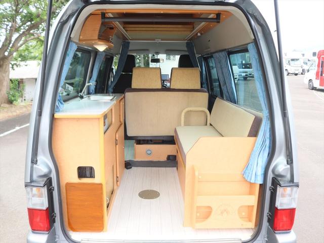 ボンゴバン キャンピングカー広島　プチ　チョイス２　キャンピングカー　ポップアップルーフ　ＦＦヒーター　ポータブル冷蔵庫　シンク　引出式カセットコンロ　サブバッテリー　走行充電　外部電源　網戸２枚　カーテン　リアラダー（48枚目）