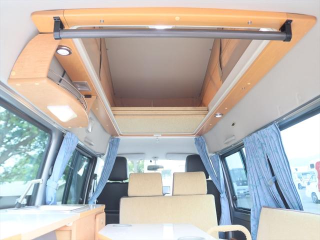 ボンゴバン キャンピングカー広島　プチ　チョイス２　キャンピングカー　ポップアップルーフ　ＦＦヒーター　ポータブル冷蔵庫　シンク　引出式カセットコンロ　サブバッテリー　走行充電　外部電源　網戸２枚　カーテン　リアラダー（50枚目）