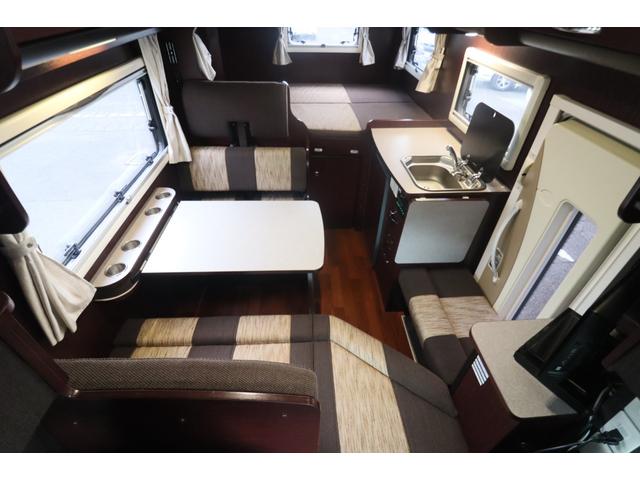 カムロード クレソンボヤージュ　エボライト　キャンピングカー　家庭用エアコン　ＦＦヒーター　ソーラーパネル　インバーター１５００Ｗ　トリプルサブ　電子レンジ　テレビ　　リアスタビライザー　強化ショック　冷蔵庫　シンク　リアクーラー　バックカメラ（2枚目）