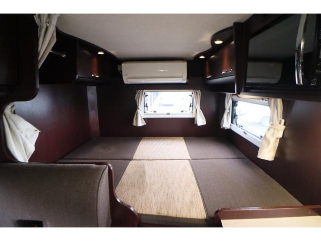 カムロード クレソンボヤージュ　エボライト　キャンピングカー　家庭用エアコン　ＦＦヒーター　ソーラーパネル　インバーター１５００Ｗ　トリプルサブ　電子レンジ　テレビ　　リアスタビライザー　強化ショック　冷蔵庫　シンク　リアクーラー　バックカメラ（6枚目）