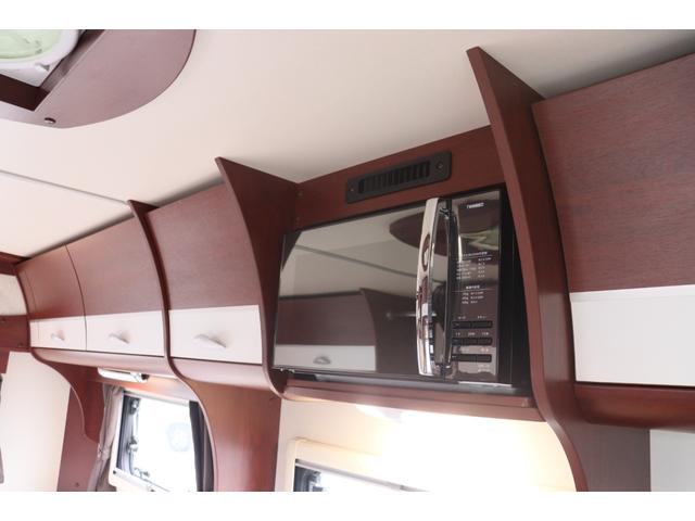 カムロード ナッツＲＶ　クレソンジャーニー　タイプＸ　先進安全装備／家庭用エアコン／急速充電／１５００Ｗインバーター／給排水タンク６０Ｌ／強化ショック／ビックＸナビ／７人乗りＦＦヒーター／液晶テレビ／電子レンジ／トリプルサブＢＴ／キャンピングカー（9枚目）