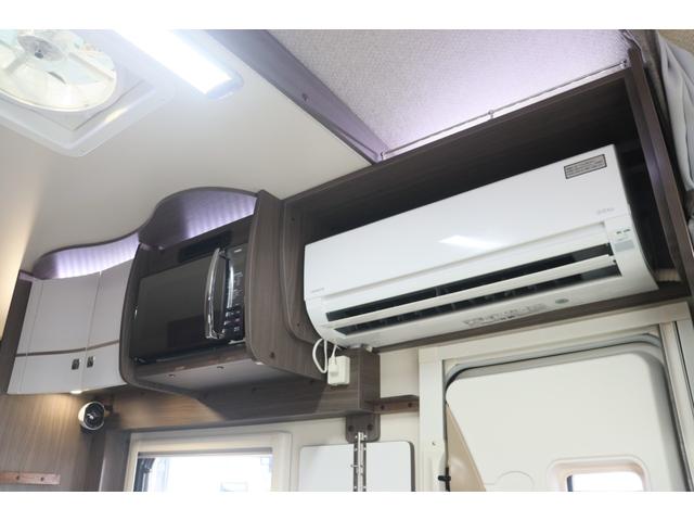 カムロード ナッツＲＶ　クレア５．３Ｗエボリューション　／後期シェル／ダブルタイヤ／家庭用エアコン／急速充電／ＦＦヒーター／テレビアーム／ナビ切替スイッチ／トリプルサブバッテリー／ソーラーパネル／リアスピーカー／９型フローティングナビ／キャンピングカー（9枚目）