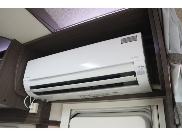 カムロード ナッツＲＶ　クレア５．３Ｗエボリューション　／後期シェル／ダブルタイヤ／家庭用エアコン／急速充電／ＦＦヒーター／テレビアーム／ナビ切替スイッチ／トリプルサブバッテリー／ソーラーパネル／リアスピーカー／９型フローティングナビ／キャンピングカー（49枚目）