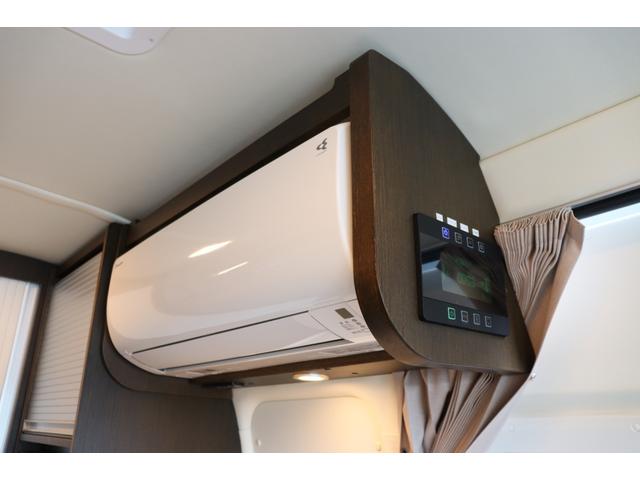 ハイエースバン トイファクトリー　アルコーバグランデ　家庭用エアコン　ＦＦヒーター　エアロソーラー　インバーター１５００Ｗ　マックスファン　カセットトイレ　電子レンジ　テレビ　ＬＥＤヘッドライト　パワスラ　スタビライザー　９インチナビ　前後ドラレコ（7枚目）