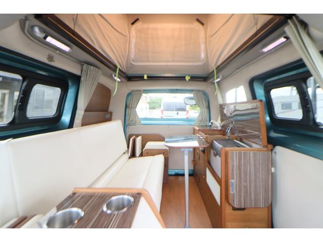 ＮＶ２００バネットバン キャンピングカー広島　ポップコンｅＥ　ポップアップルーフ／ＦＦヒーター／フレキシブルソーラーパネル／冷蔵庫／シングルサブ／走行充電／外部充電／４００Ｗインバーター／ナビ切替ＳＷ／網戸／メモリーナビ／バックカメラ／ＥＴＣ／キャンピングカー（2枚目）