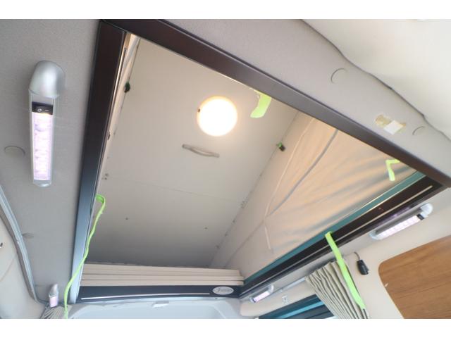 ＮＶ２００バネットバン キャンピングカー広島　ポップコンｅＥ　ポップアップルーフ／ＦＦヒーター／フレキシブルソーラーパネル／冷蔵庫／シングルサブ／走行充電／外部充電／４００Ｗインバーター／ナビ切替ＳＷ／網戸／メモリーナビ／バックカメラ／ＥＴＣ／キャンピングカー（5枚目）