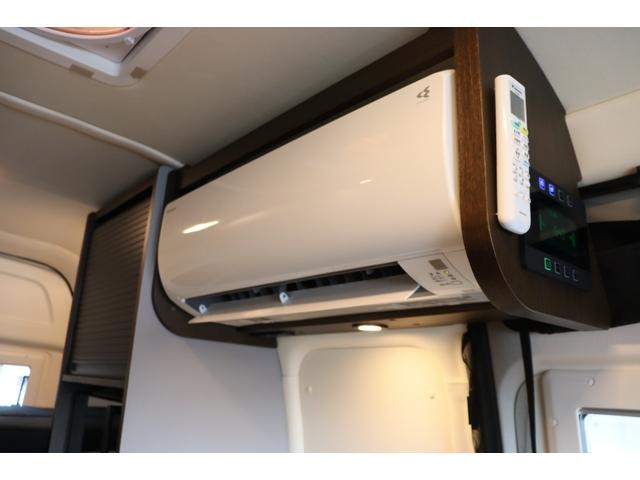 ハイエースバン トイファクトリー　ＧＴ　カーサブラックＥＤ　グランデ／クールコンプシステム（家庭用エアコン）／エアロソーラー／テレビ／ＦＦヒーター／ブリッド２脚／電子レンジ／内部電源／デジタルインナードラレコ／ＥＴＣ／特別色エアロウィンドウ／キャンピングカー（7枚目）