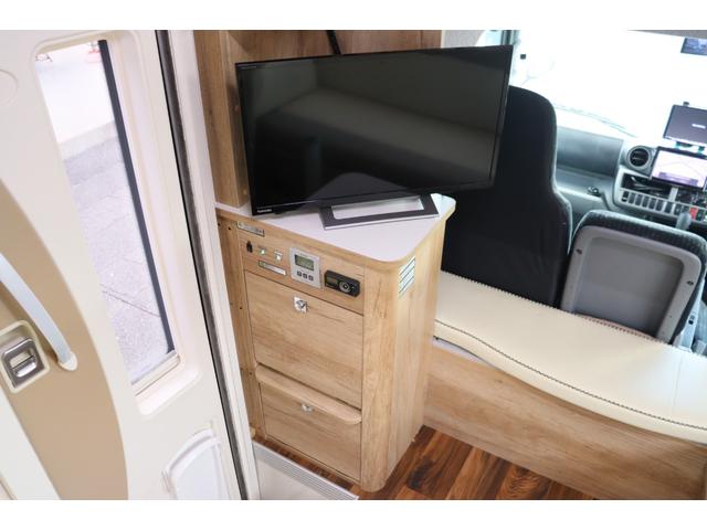 カムロード ナッツＲＶ　クレア５．０Ｘエボリューション　キャンピングカー　家庭用エアコン　ＦＦヒーター　インバーター１５００Ｗ　トリプルサブＢＴ　電子レンジ　テレビ　冷蔵庫　オーニング　マックスファン　８Ｖ型ナビ　Ｂｌｕｅｔｏｏｔｈ　前後ドラレコ　ＥＴＣ（9枚目）
