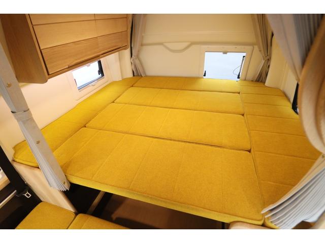 ハイエースバン トイファクトリー　バーデン　カリモク　グランデ仕様　クールコンプシステム　エアロソーラー　ＦＦヒーター　マックスファン　電子レンジ　テレビ　内部電源　トイファクトリー製強化リーフ　リアスタビライザー　オーリンズショック　１０インチナビ　キャンピングカー（6枚目）