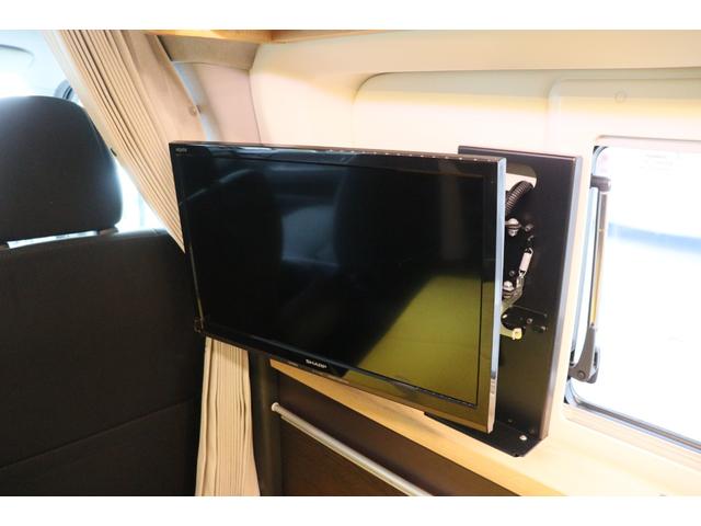 ハイエースバン トイファクトリー　バーデン　カリモク　グランデ仕様　クールコンプシステム　エアロソーラー　ＦＦヒーター　マックスファン　電子レンジ　テレビ　内部電源　トイファクトリー製強化リーフ　リアスタビライザー　オーリンズショック　１０インチナビ　キャンピングカー（11枚目）