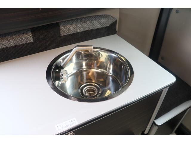 ＮＶ２００バネットバン キャンピングカー広島　ポップコン　キャンパーＲ　ポップアップルーフ／ＦＦヒーター／ツインサブＢＴ／走行充電／外部充電／１５００Ｗインバーター／液晶テレビ／地デジチューナー／ダウンギャレー／メモリーナビ／バックカメラ／前後ドラレコ／キャンピングカー（57枚目）