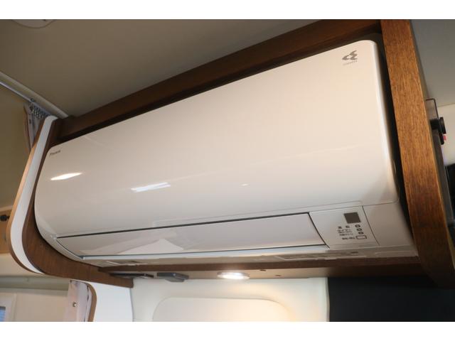 ハイエースバン トイファクトリー バーデングランデ カーサ 家庭用エアコン FFヒーター エアロソーラー オルタネータチャージャー800W 内部電源 インバーター1500W 強化リーフ マックスファン 電子レンジ PVM アルパイン製11インチナビ ETC(9枚目)