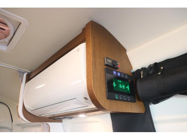 ハイエースバン トイファクトリー バーデングランデ カーサ 家庭用エアコン FFヒーター エアロソーラー オルタネータチャージャー800W 内部電源 インバーター1500W 強化リーフ マックスファン 電子レンジ PVM アルパイン製11インチナビ ETC(25枚目)