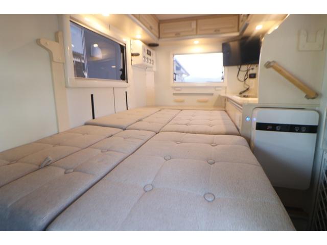 ハイゼットトラック ＪＰスター　ハッピー１＋　４ＷＤ　４００Ａｈリチウム／１２Ｖクーラー／ＦＦヒーター／冷蔵庫／液晶テレビ／電子レンジ／マックスファン／サイバーナビ／ＥＴＣ２．０／前後ドラレコ／前後スタビ／社外ショック／リアエアロ／キャンピングカー（6枚目）