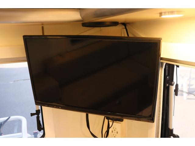 ハイゼットトラック ＪＰスター　ハッピー１＋　４ＷＤ　４００Ａｈリチウム／１２Ｖクーラー／ＦＦヒーター／冷蔵庫／液晶テレビ／電子レンジ／マックスファン／サイバーナビ／ＥＴＣ２．０／前後ドラレコ／前後スタビ／社外ショック／リアエアロ／キャンピングカー（7枚目）