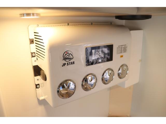 ハイゼットトラック ＪＰスター　ハッピー１＋　４ＷＤ　４００Ａｈリチウム／１２Ｖクーラー／ＦＦヒーター／冷蔵庫／液晶テレビ／電子レンジ／マックスファン／サイバーナビ／ＥＴＣ２．０／前後ドラレコ／前後スタビ／社外ショック／リアエアロ／キャンピングカー（10枚目）