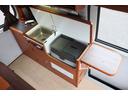 タウンエースバン キャンピングカー広島　ピコ　ポップアップルーフ　キャンピングカー　ＦＦヒーター　３５０Ｗインバーター　外部充電シンク　ポータブル冷蔵庫　サブバッテリー　走行充電　ＳＤナビ　バックカメラ　ＥＴＣ　フロントスポイラー（6枚目）