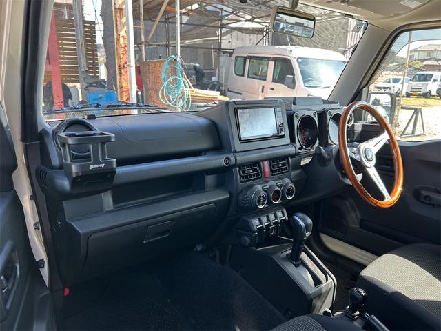 ジムニー ＸＬ　４ＷＤ　ＥＴＣ　バックカメラ　ナビ　ＴＶ　オートライト　スマートキー　アイドリングストップ　電動格納ミラー　シートヒーター　ＡＴ　盗難防止システム　ＡＢＳ　ＥＳＣ　ＣＤ　ＤＶＤ再生　ＵＳＢ（34枚目）