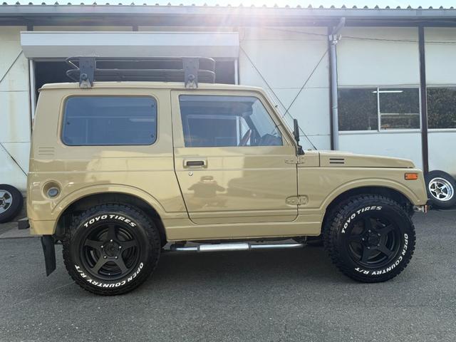 ジムニー ワイルドウインドリミテッド　オールペイント　社外バンパー　ディスプレイオーディオ　サイドステップ　ルーフキャリア　１６インチアルミホイール　タンクガード（5枚目）